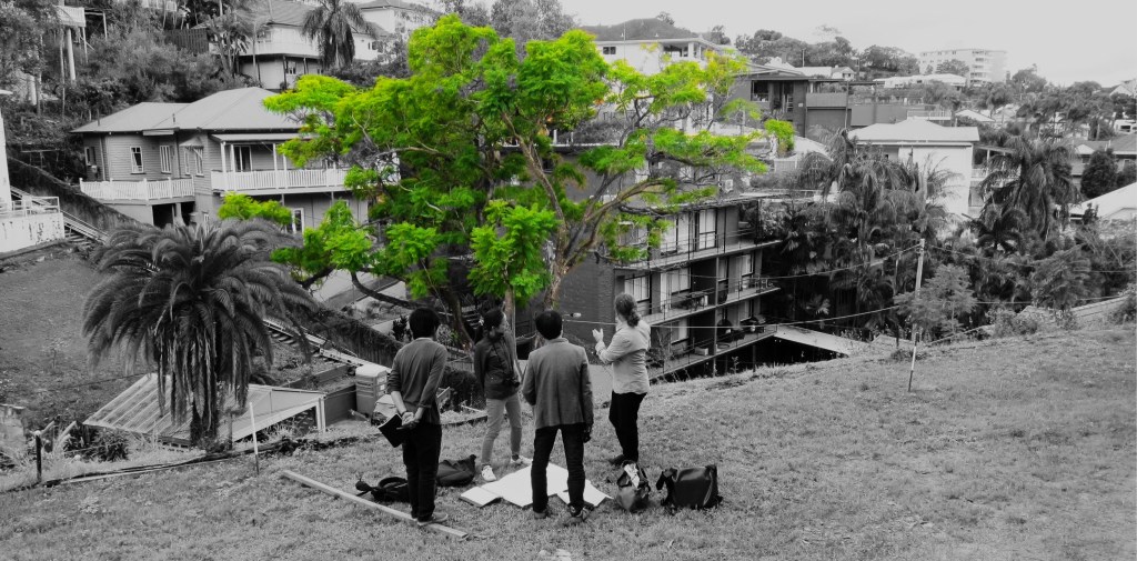 Yohei Omura, Chie Konno, Yo Shimada and Paul Hotston discuss the tree.
