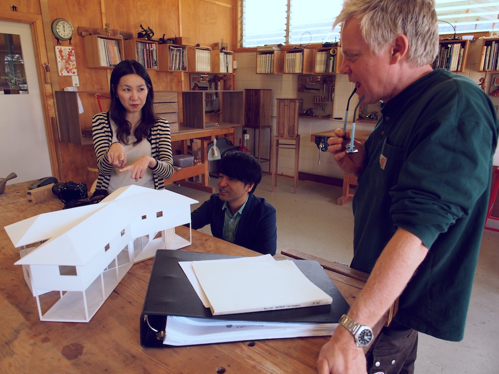 Ishii san explains the design to Roy.