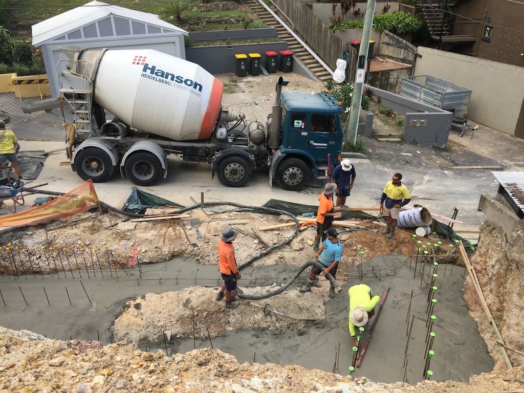 Pouring the footings for the garage.