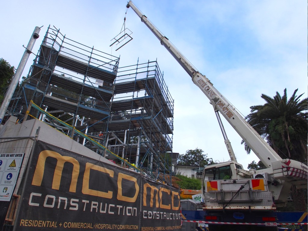 Surgical precision required of the crane driver.