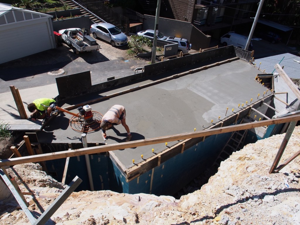 The concrete garage roof slab is poured.