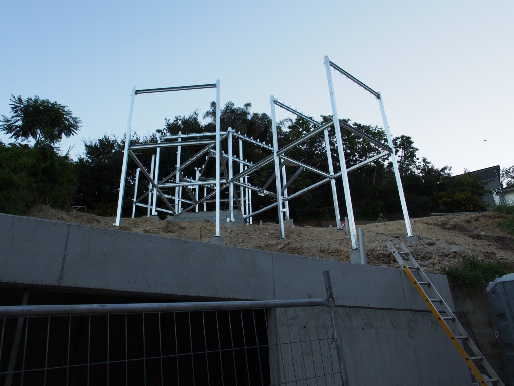 Like a shiny sculpture or a robot skeleton.