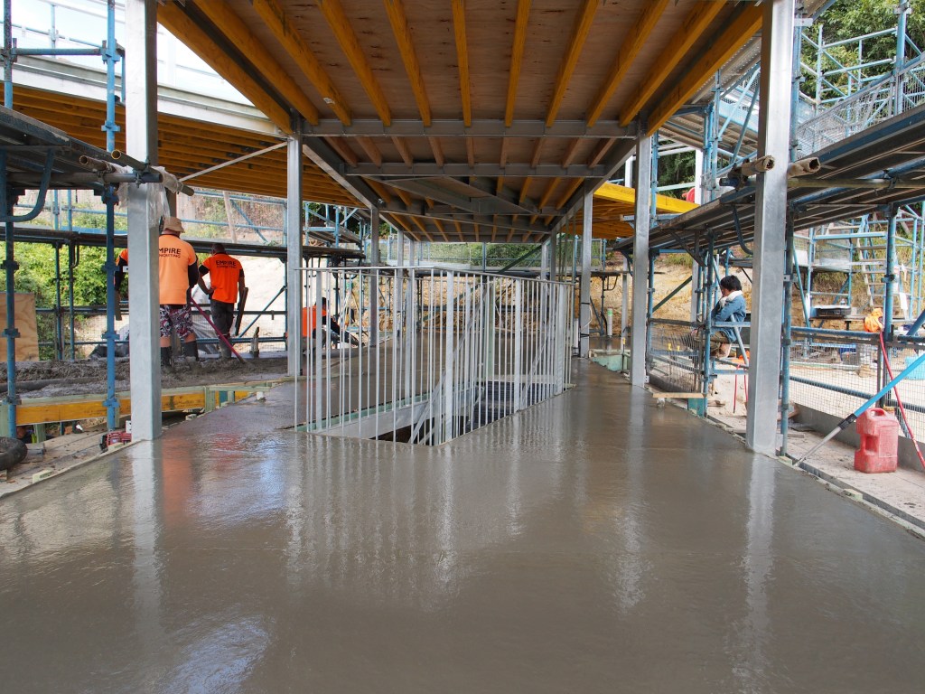The stairwell punching up though the slab.