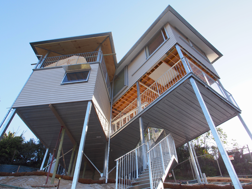 The refined gutters cut an expected sharp edge to the eaves.